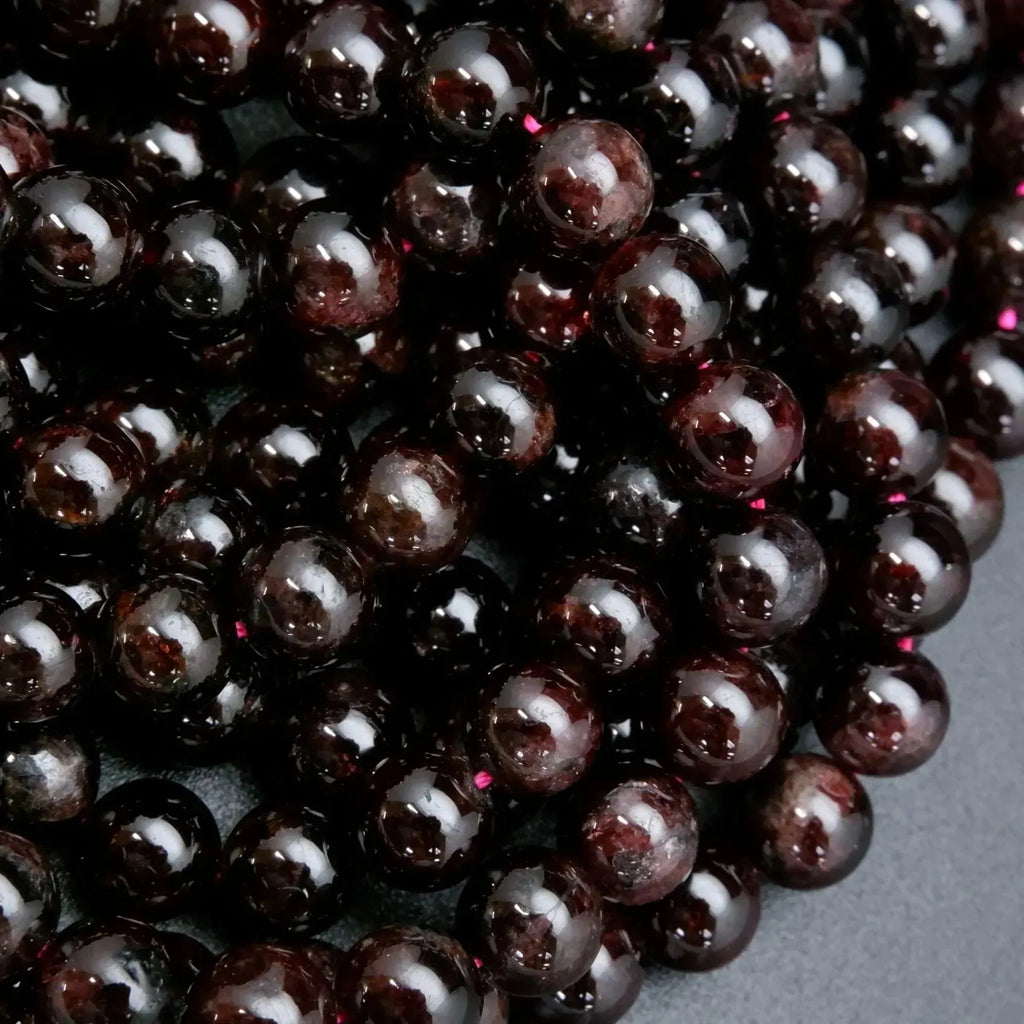 Deep red polished garnet beads.