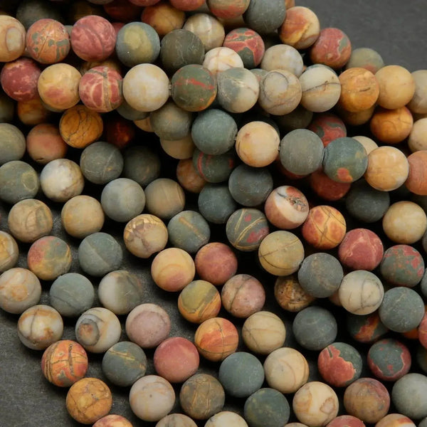 Green, red, and yellow matte finish red creek jasper beads.