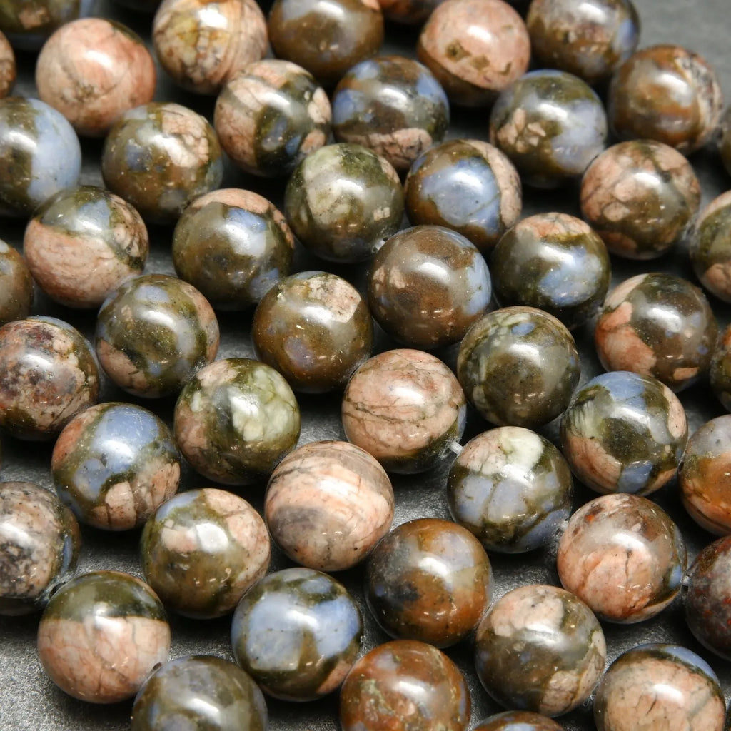 Blue quartz and pink feldspar in brown round beads.