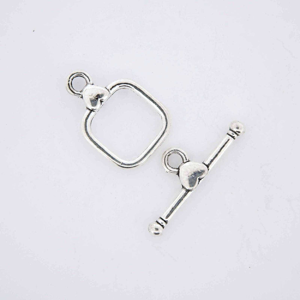 Silver jewelry toggle clasp.