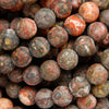 Red leopard skin jasper beads matte finish rounds.