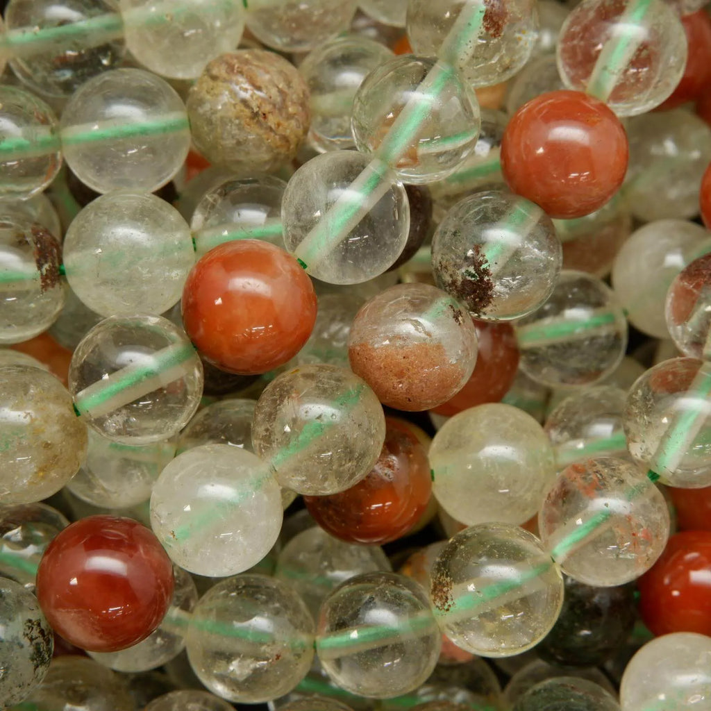 Clear and red phantom quartz beads.